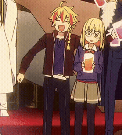 A Boy And A Girl Are Standing Next To Each Other Holding Drinks GIF