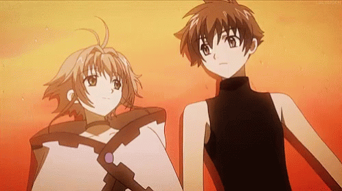 A Boy And A Girl Are Standing Next To Each Other Holding Hands In Front Of A Red Background . GIF