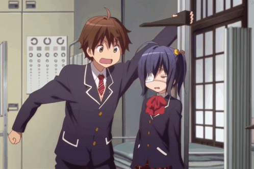 A Boy And A Girl Are Standing Next To Each Other In Front Of A Sign That Says " O " GIF