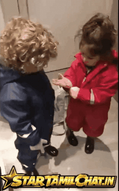 A Boy And A Girl Are Standing Next To Each Other With A Star That Says Startamilchat.in GIF
