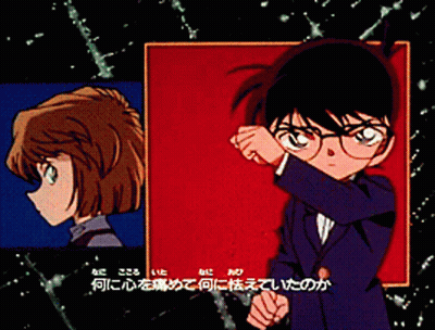 A Boy And A Girl Are Standing Next To Each Other With Foreign Writing On The Bottom GIF