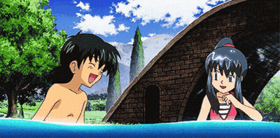 A Boy And A Girl Are Swimming In The Water And Laughing GIF