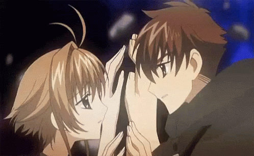 A Boy And A Girl Are Touching Each Other 'S Faces In An Anime Scene . GIF