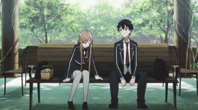 A Boy And A Girl Sit On A Park Bench GIF