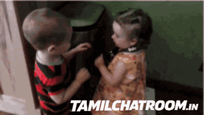 A Boy And A Girl Standing Next To Each Other With Tamilchatroom.in Written On The Bottom Right GIF