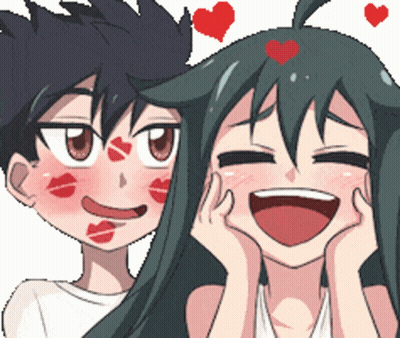 A Boy And A Girl With Red Kisses On Their Face GIF