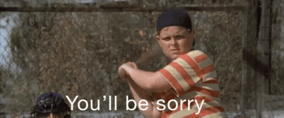 A Boy Holding A Baseball Bat With The Words " You 'Ll Be Sorry " Behind Him GIF