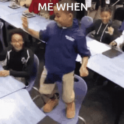 A Boy In A Blue Hoodie Is Dancing In A Classroom With The Words " Me When " On The Bottom GIF