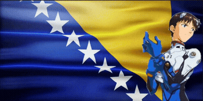A Boy In A Blue Suit With The Number 01 On His Chest Stands In Front Of A Yellow And Blue Flag GIF