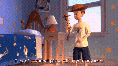 A Boy In A Cowboy Hat Is Holding A Woody Doll And Saying I Don 'T Wanna Play With You Anymore GIF