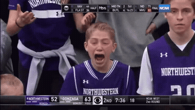 A Boy In A Purple Northwest Jersey Is Crying During A Basketball Game GIF