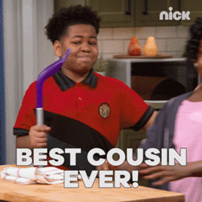 A Boy In A Red Shirt Is Holding A Purple Object And The Words Best Cousin Ever Are Below Him GIF