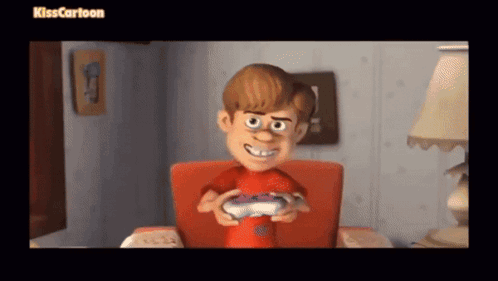 A Boy In A Red Shirt Is Holding A Video Game Controller While Sitting In A Chair .. GIF