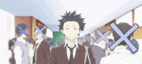 A Boy In A Suit And Tie Is Standing In A Crowd Of People With Crosses On His Face . GIF