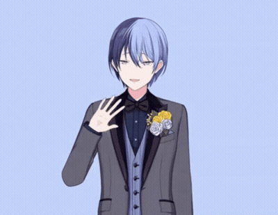 A Boy In A Tuxedo With Flowers In His Pocket Waving GIF