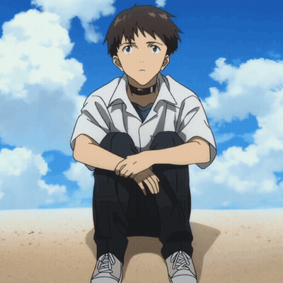 A Boy In A White Shirt Is Sitting On The Ground With His Legs Crossed GIF
