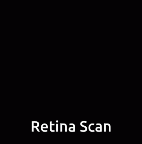 A Boy Is Looking Through A Magnifying Glass With The Words Retina Scan Written Below Him GIF