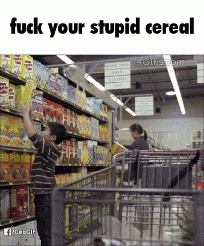 A Boy Is Reaching For A Box Of Lucky Charms Cereal GIF