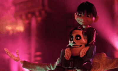 A Boy Is Sitting On A Skeleton 'S Shoulders In A Dark Room GIF