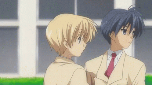 A Boy Is Throwing A Book In The Air While Another Boy Watches . GIF