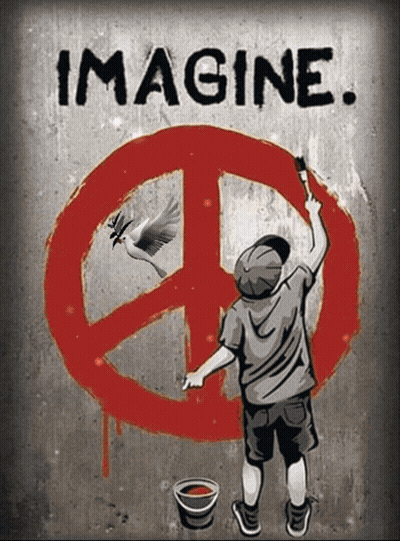 A Boy Paints A Peace Sign On A Wall With The Words Imagine Below It GIF
