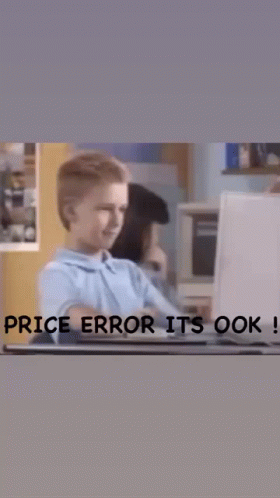 A Boy Sitting In Front Of A Laptop With The Words Price Error It 'S Ok On The Bottom GIF