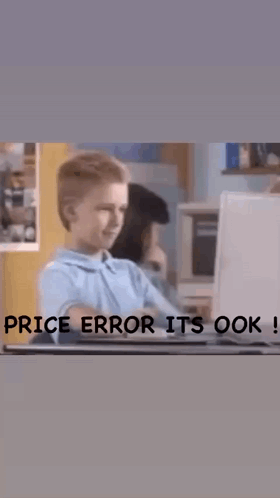 A Boy Sitting In Front Of A Laptop With The Words Price Error It 'S Ok On The Bottom GIF