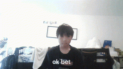 A Boy Wearing A Black Shirt With Ok Bet Written On It GIF