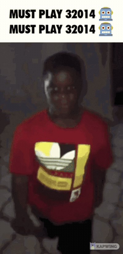 A Boy Wearing A Red Adidas Shirt Stands In Front Of A Sign That Says Must Play 32014 GIF