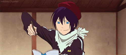 A Boy Wearing A Red Beret Is Holding A Book And A Pen GIF