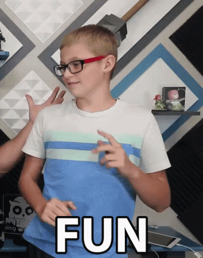 A Boy Wearing Glasses And A Blue Shirt With The Word Fun Written On It GIF