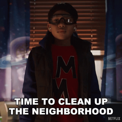 A Boy Wearing Goggles And A Red Shirt With The Letter M On It Says Time To Clean Up The Neighborhood GIF