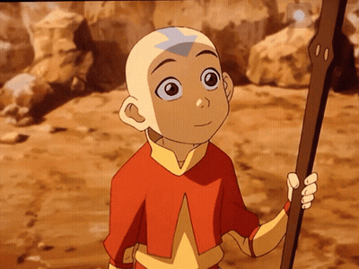 A Boy With A Bald Head Is Holding A Stick GIF
