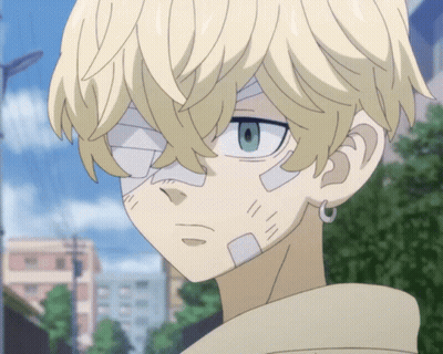 A Boy With A Bandage On His Face Looks At The Camera GIF