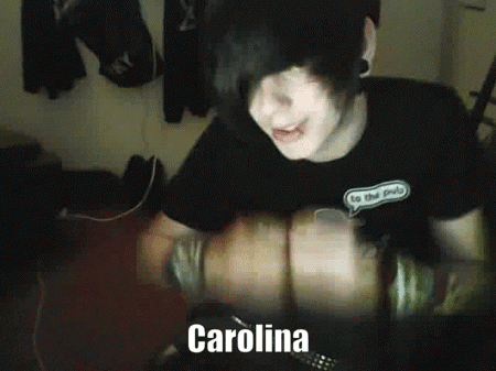 A Boy With A Black Shirt That Says To The Pub GIF
