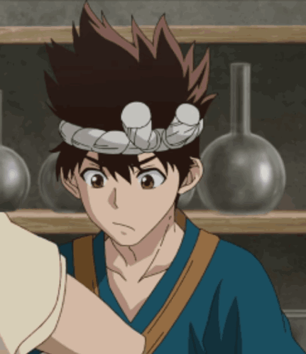 A Boy With A Headband On His Head Is Standing In Front Of A Shelf Full Of Vases GIF