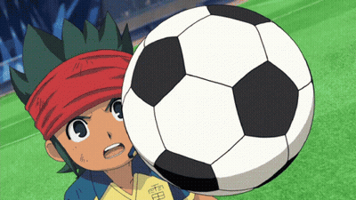 A Boy With A Red Headband Is Holding A Soccer Ball With The Letter H On It GIF