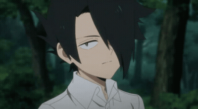 A Boy With Black Hair And A White Shirt Is Smiling And Waving His Hand GIF