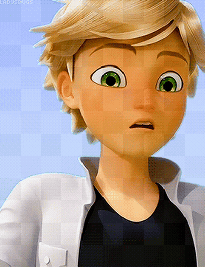 A Boy With Blonde Hair And Green Eyes Is Wearing A Black Shirt And A White Jacket GIF