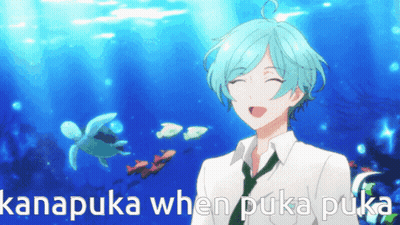 A Boy With Blue Hair Is Smiling In Front Of A Sea Turtle And The Words Kanapika When Puka Puka GIF