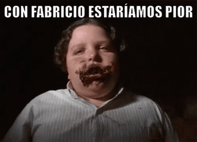 A Boy With Chocolate On His Face And The Words `` Con Fabricio Estariamos Pior '' Above Him . GIF