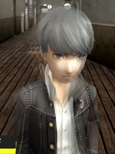 A Boy With Gray Hair Is Standing On A Wooden Floor In A Hallway GIF
