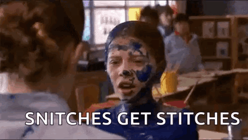 A Boy With His Face Covered In Blue Paint Is Talking To A Girl . GIF