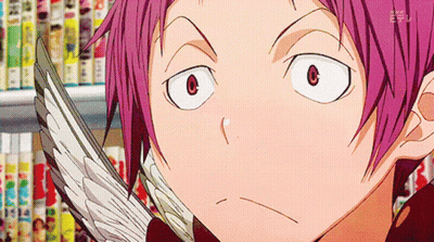 A Boy With Pink Hair Is Holding A Bird 'S Wing In Front Of Bookshelves GIF