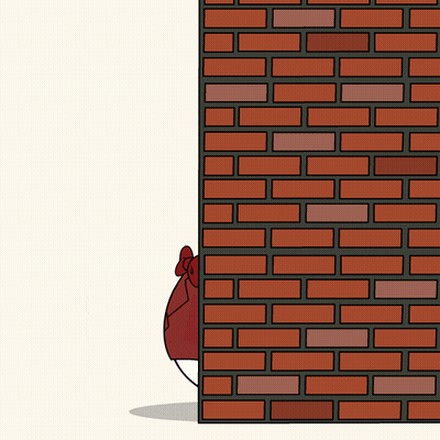A Brick Wall With A Cartoon Character Peeking Out Of It GIF