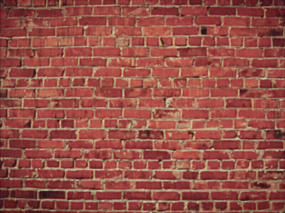 A Brick Wall With Flames Coming Out Of The Center GIF