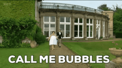 A Bride And Groom Walking Down A Path With The Words Call Me Bubbles GIF