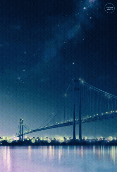 A Bridge Over A Body Of Water At Night With The Word Sugar Written Below It GIF