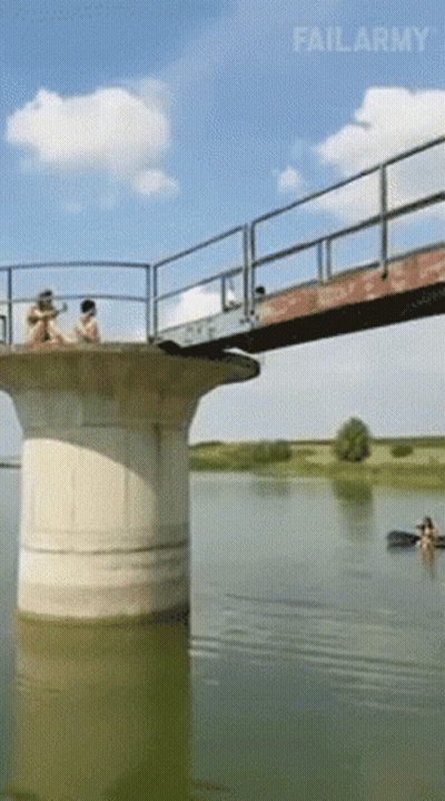 A Bridge Over A Body Of Water With Failarmy Written On The Bottom Right GIF
