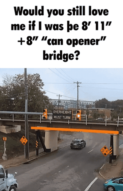 A Bridge With A Sign That Says " Overheight Must Turn " On It GIF